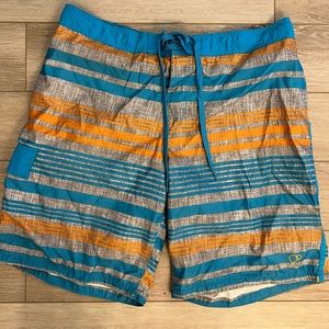 New without tags, OP Men’s swim trunks, blue and orange, XL 40-42